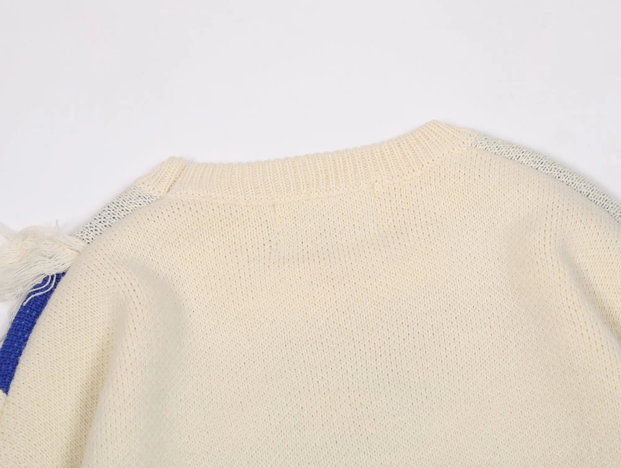 Tassel Groove | Textured Patchwork Sweater